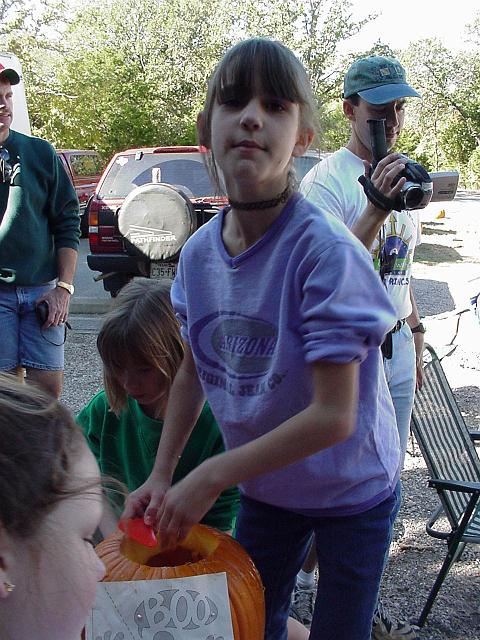 Christine Albrecht Carving pumpkin 1999 Fall campout.JPG